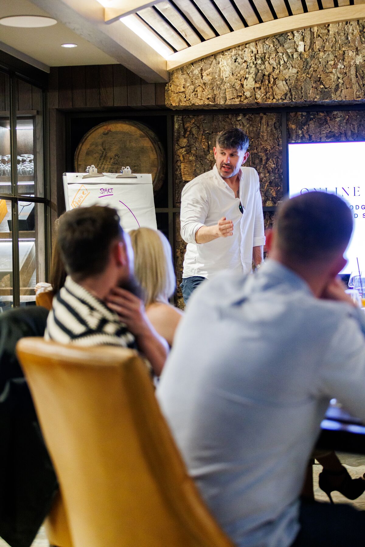 Gordy speaking to a group in a workshop